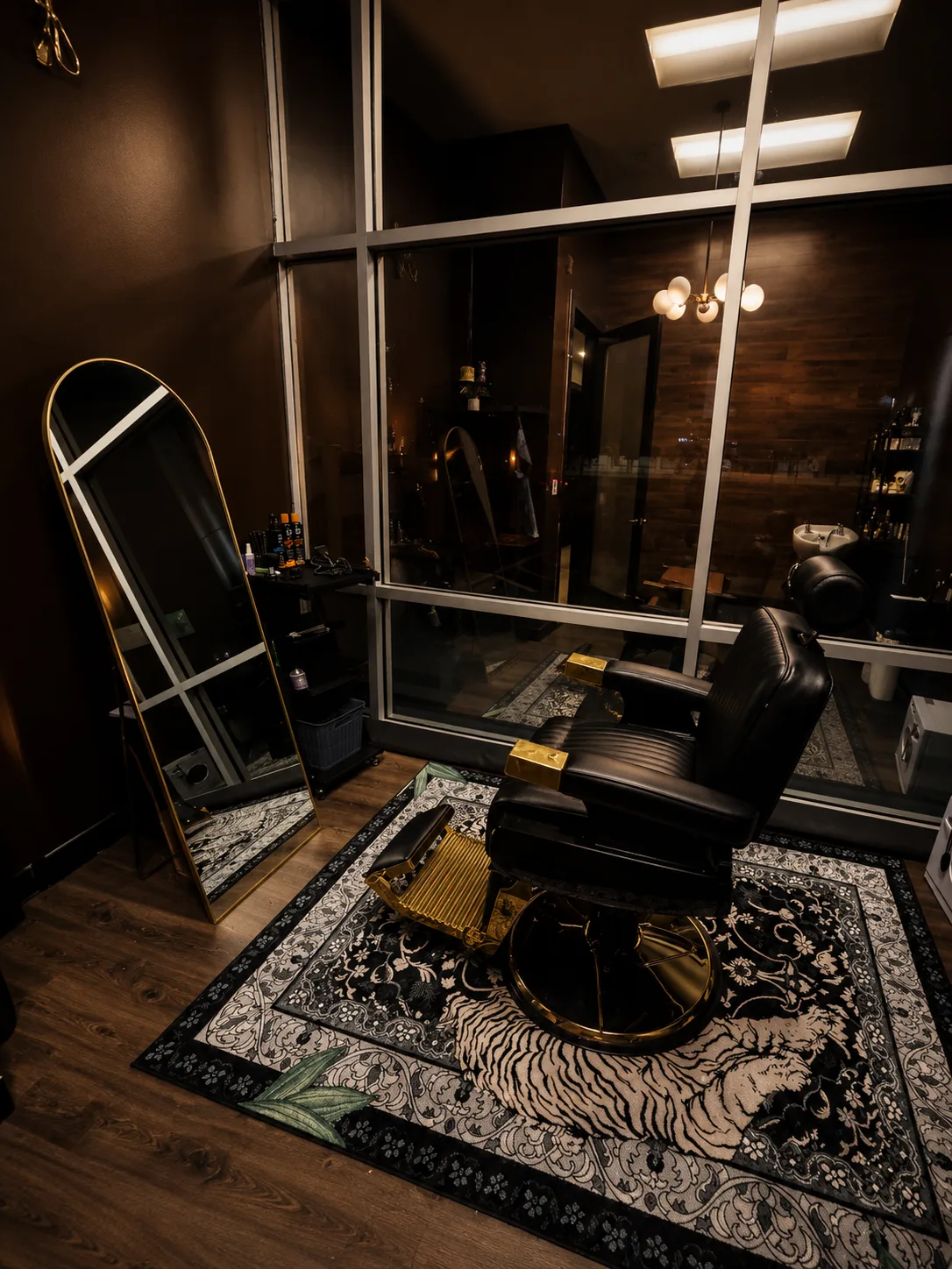 The suite at night: the chair, the mirror, and the window
